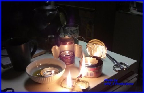 kudlich lit in the front, Veggy, Veggie oil lamps, floating candles, Hurricane candles, Hurricane Lamps, improvised lamps, vegetable oil lamps, made from pop cans, tuna cans, salmon cans, natural fibre jute string, natural fiber jute string.